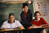 two students with teacher